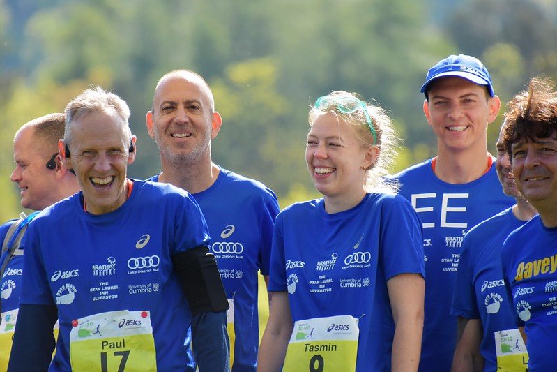 A group of Brathay 10in10 runners in blue